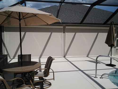 View of outdoor motorized patio screens from the exterior